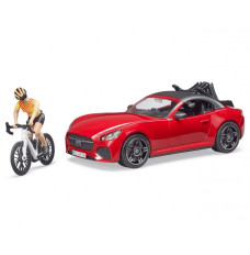 Auto Roadster red with a figurine and a mountain bike